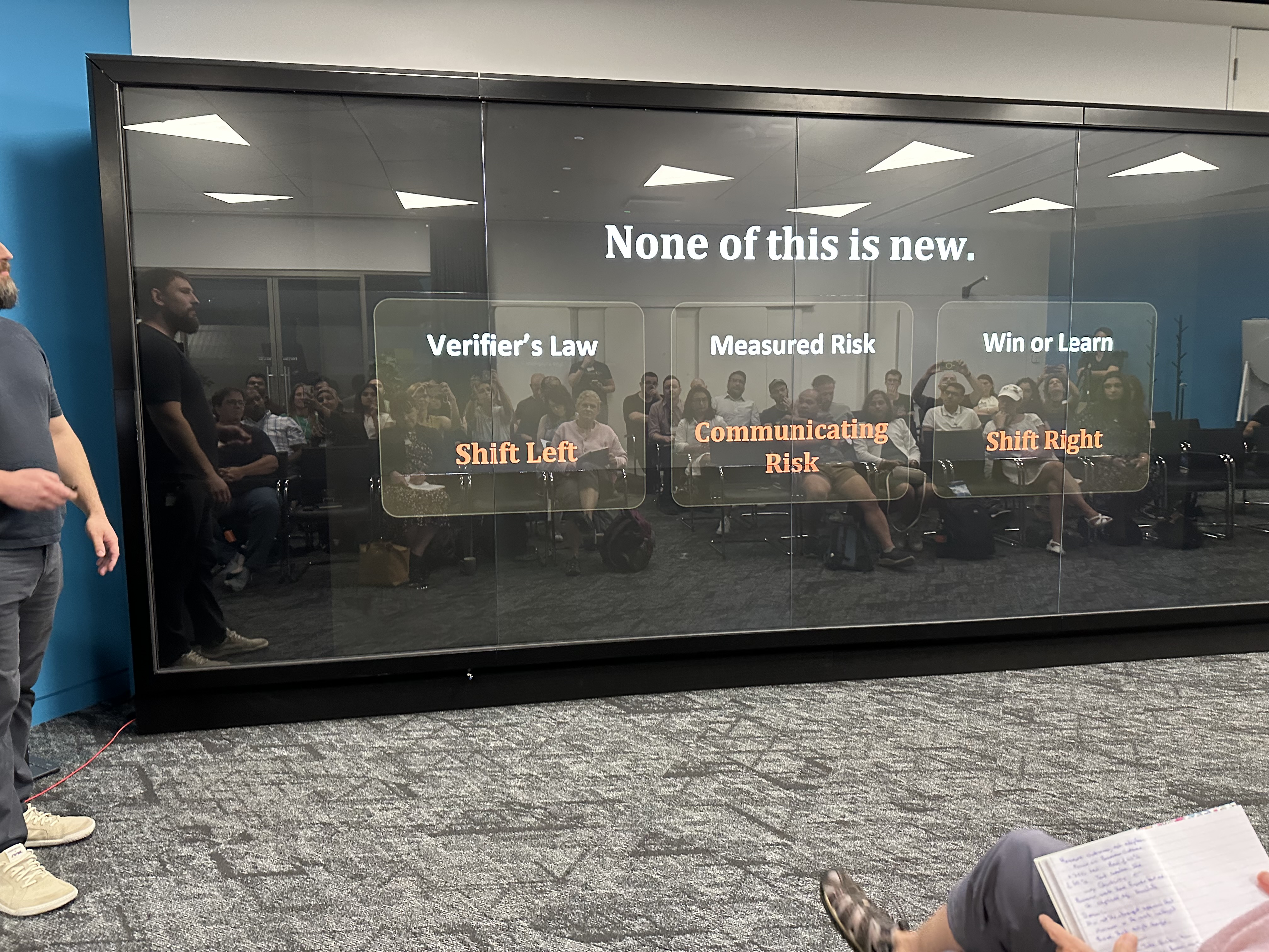 James Pearce is presenting a slide about things that remain the same in this era for AI that says ‘None of this is ne... image
