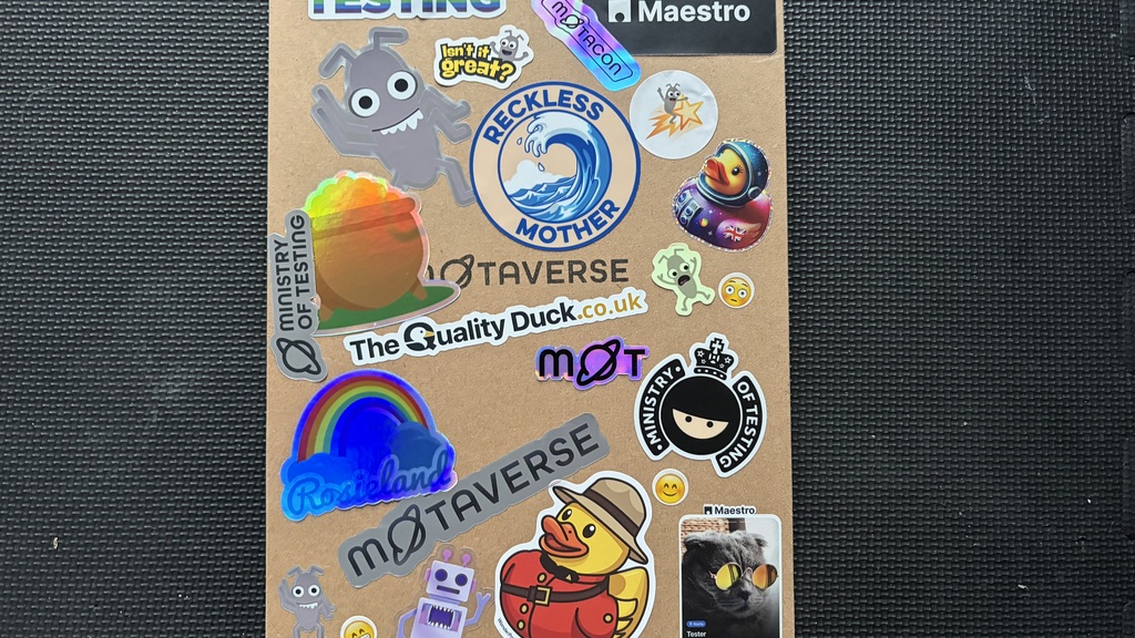 A wooden clipboard with a variety of stickers on it. image
