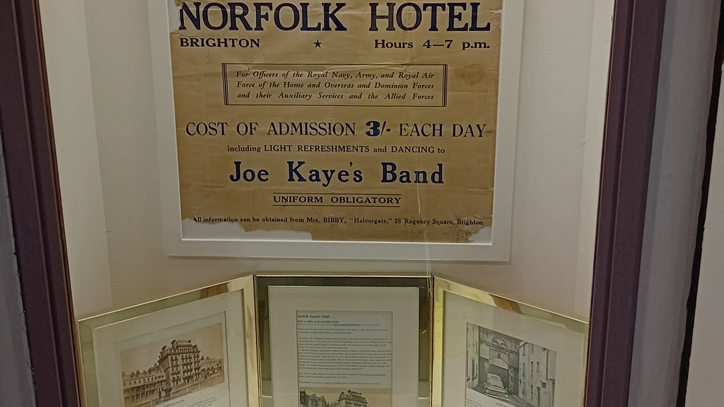 Photograph showing old pictures in a display of the Norfolk Hotel in Brighton, above the photo there is an historic a... image