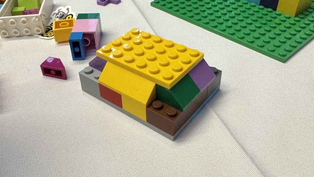 Photo of a small Lego structure on a table  image