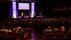 A shot from the back of the room during Demi Van Malcot's talk. image