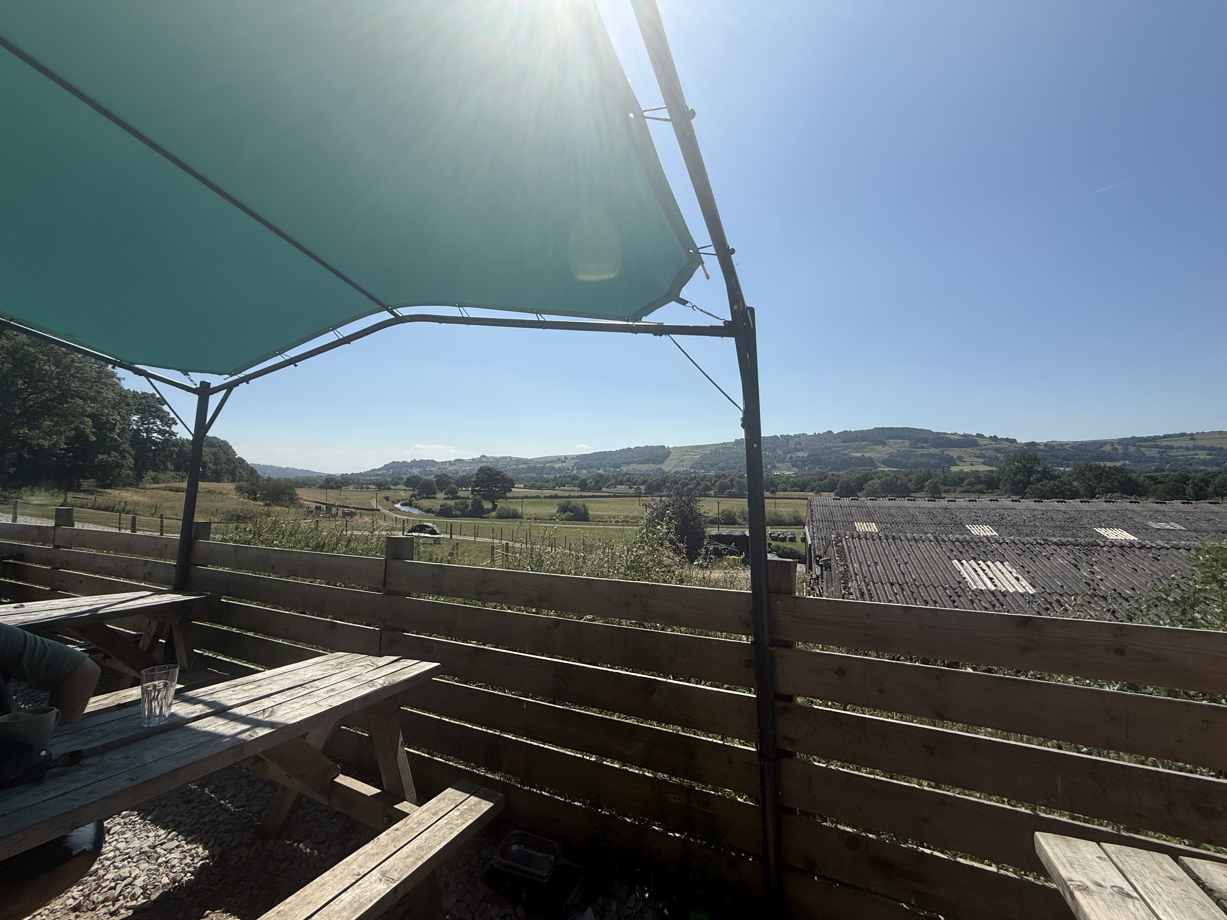 A view of the valley from a canal side cafe. You can see across to the rolling hills with houses interspersed with gr... image
