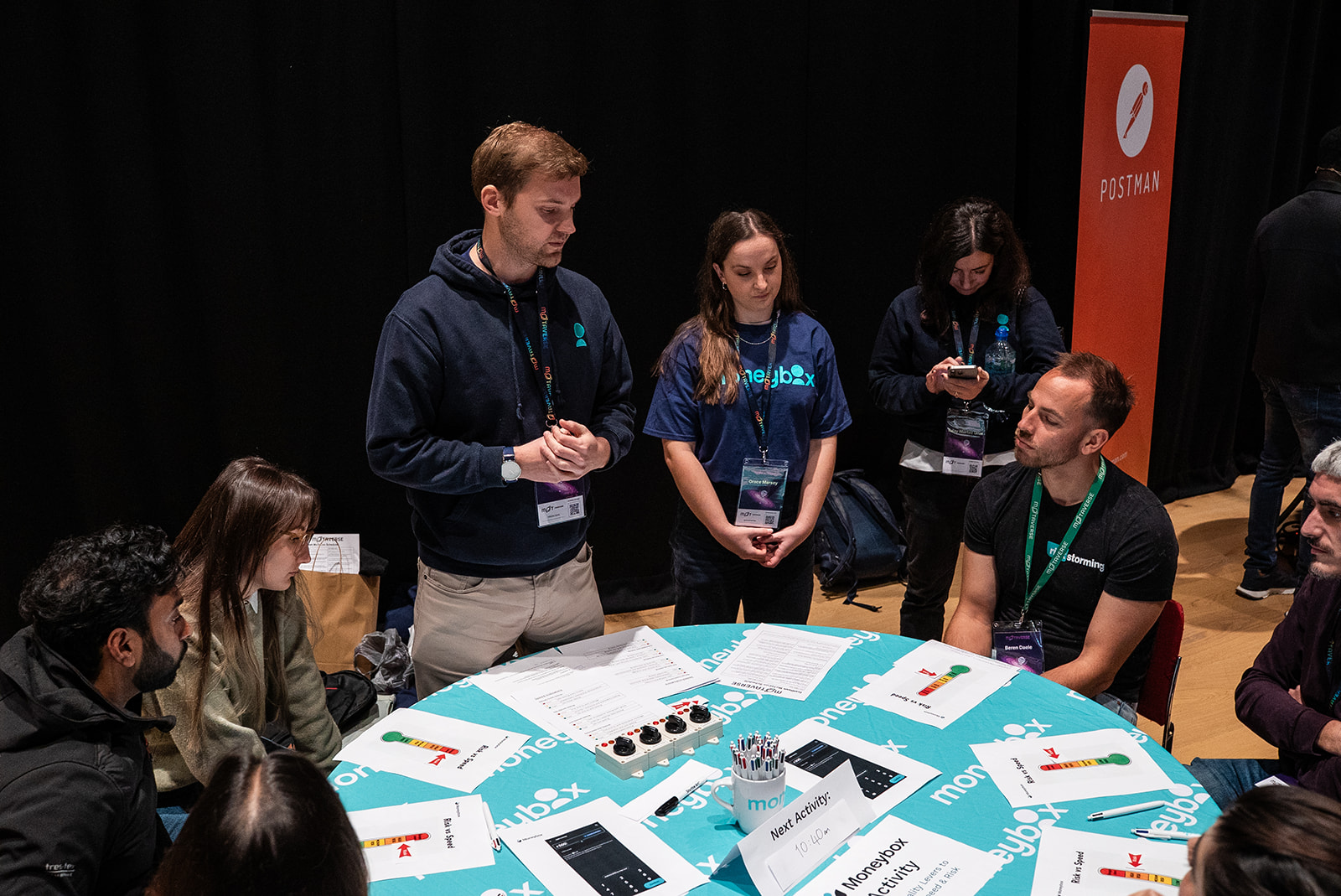 Robbie Falck and Grace Marsey from MoneyBox presenting at MoTaCon