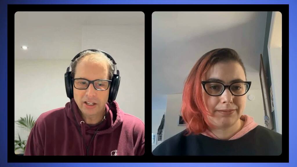 A woman and man on a video call. image