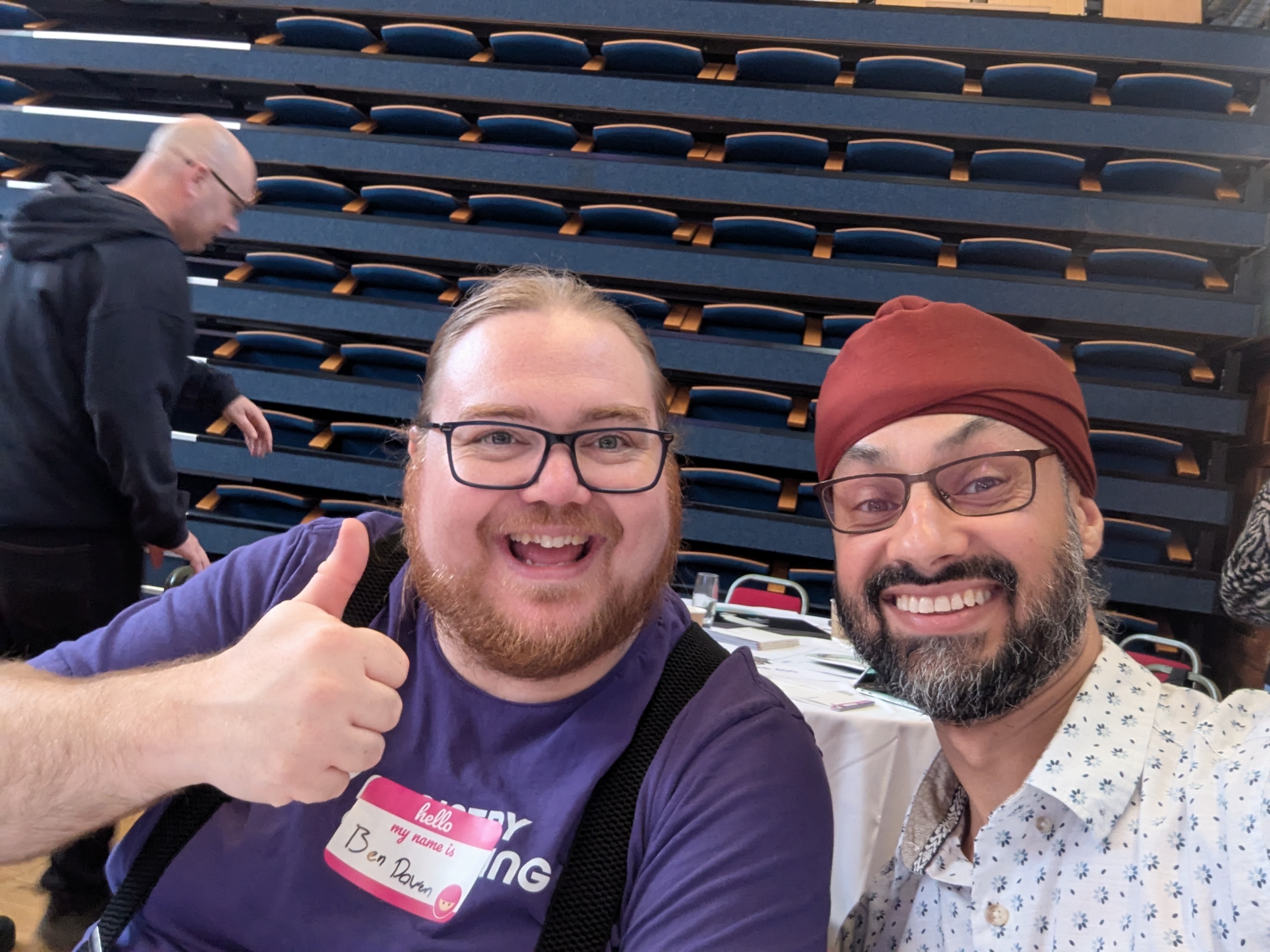 A picture of Dalbir Sehmbi and Ben Dowen sitting next to each other
