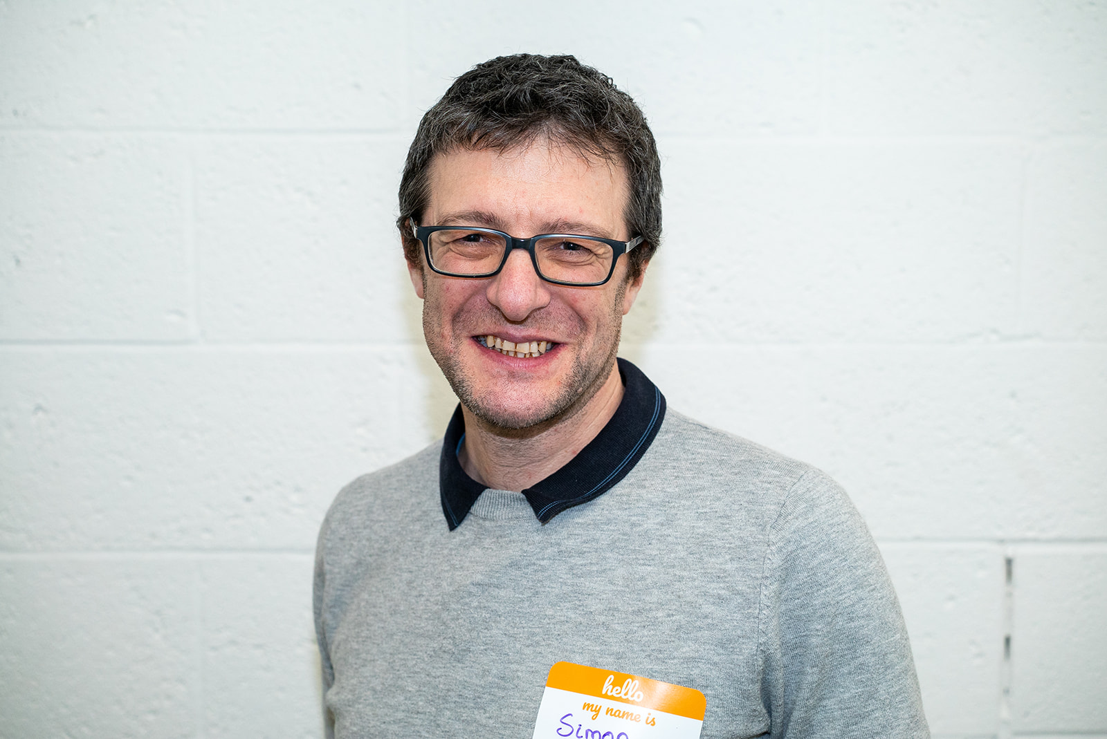 A portrait photo of Simon Devon