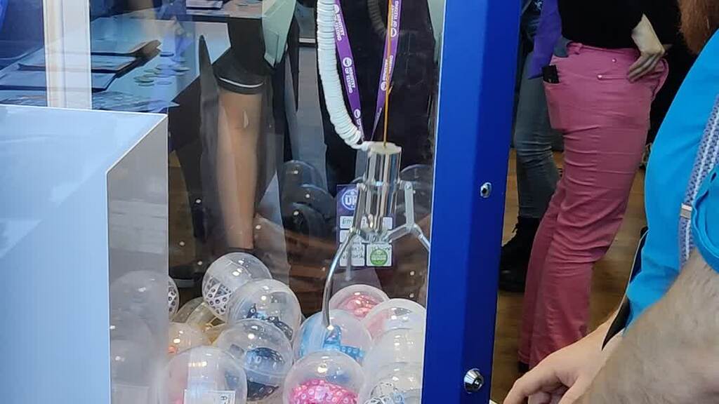 Toy machine being played by individual.