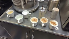 N: I'll have some tea. 
N: *gets hot water from the machine on the left*
N: Oh, they have hot chocolate as well!
L: That's fine, I'll take the hot water then.
N: *accidentally gets plain hot mi... image