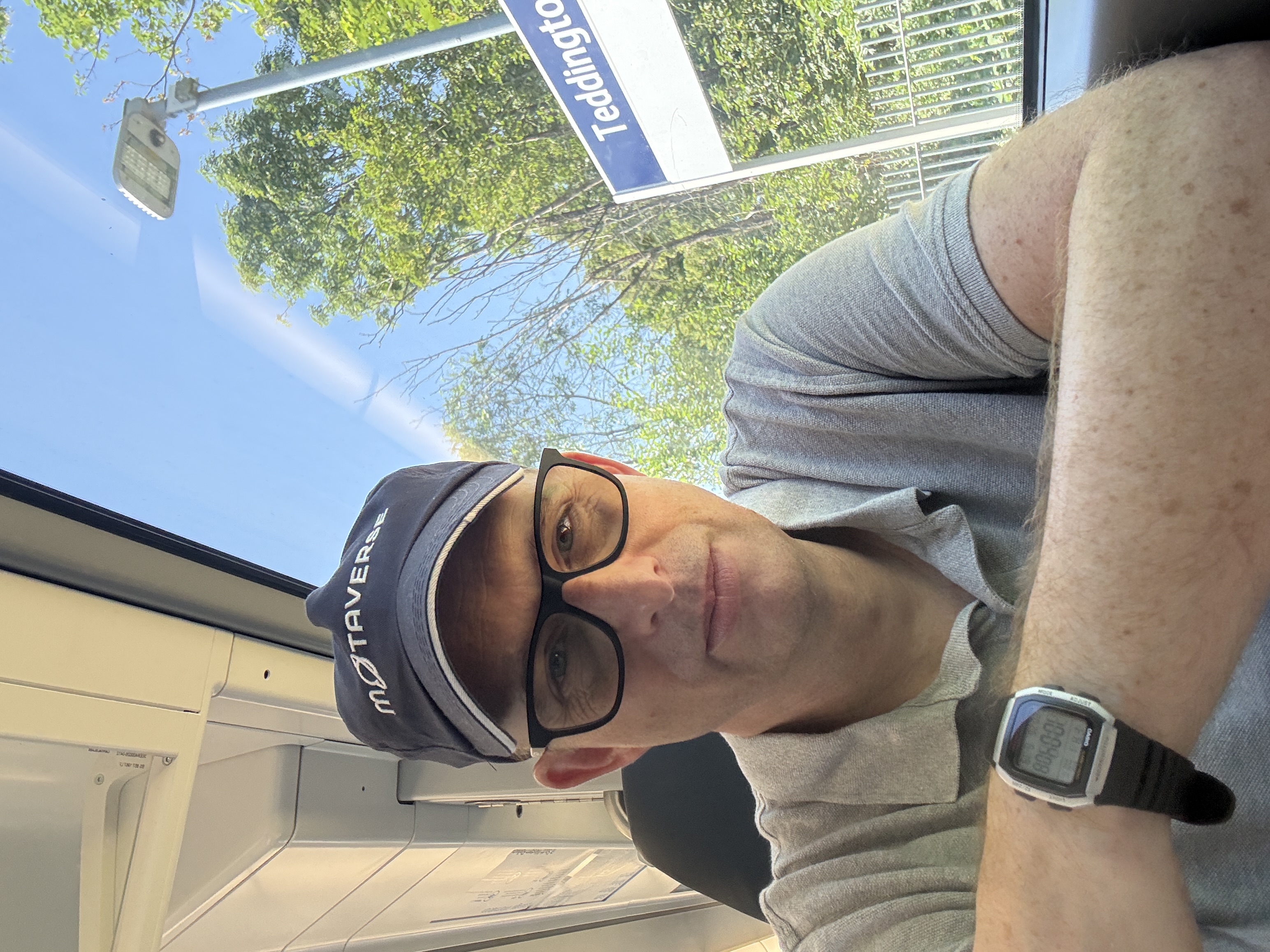 Selfie of a man on a train.  image