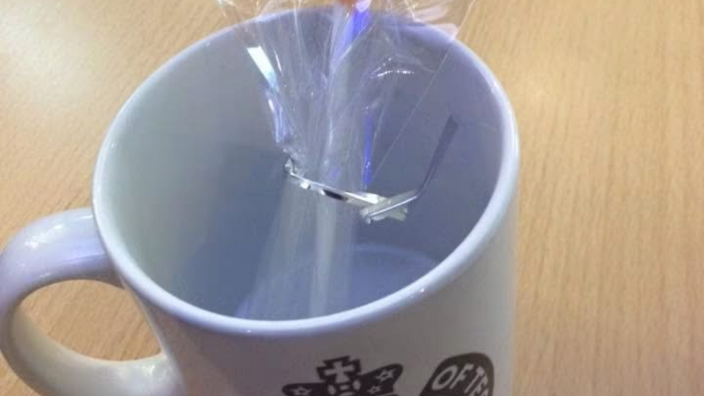 A cake pop in a mug image