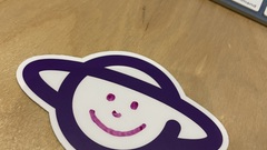 Is it a planet or a happy person? image