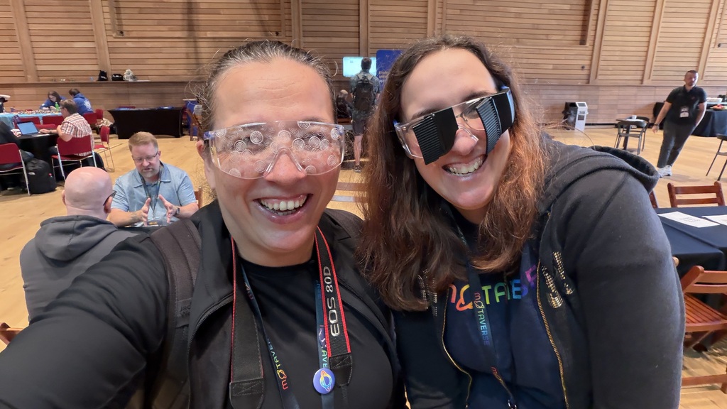 Demi and Rosie selfie, wearing glasses that simulate visual disabilities. image