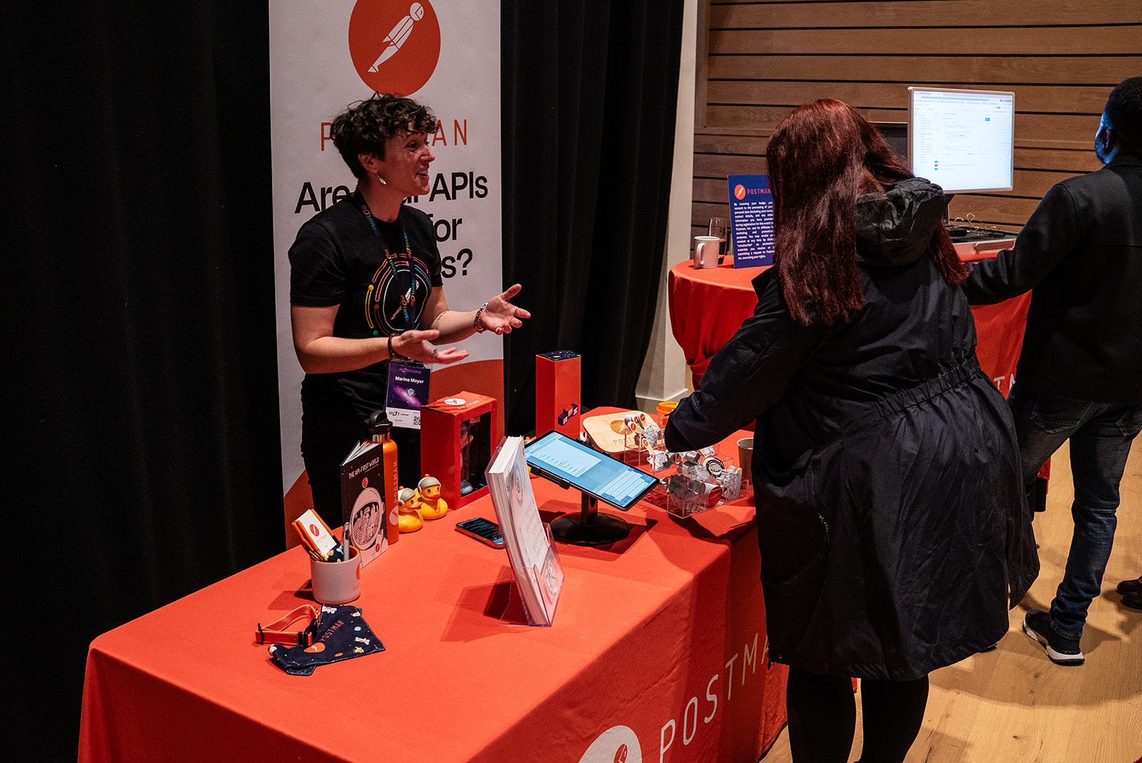 Marine Meyer from Postman at a MoTaCon25 sponsor stand