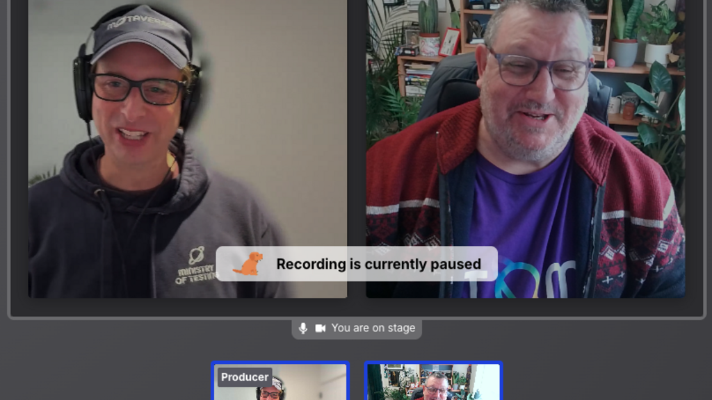 Screen recording of Simon in a black Ministry of Testing hoodie, cap and headphones on one side. Ady is in a purple M... image