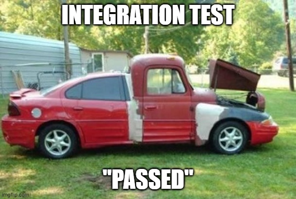 A red car on grass, build together with different car parts