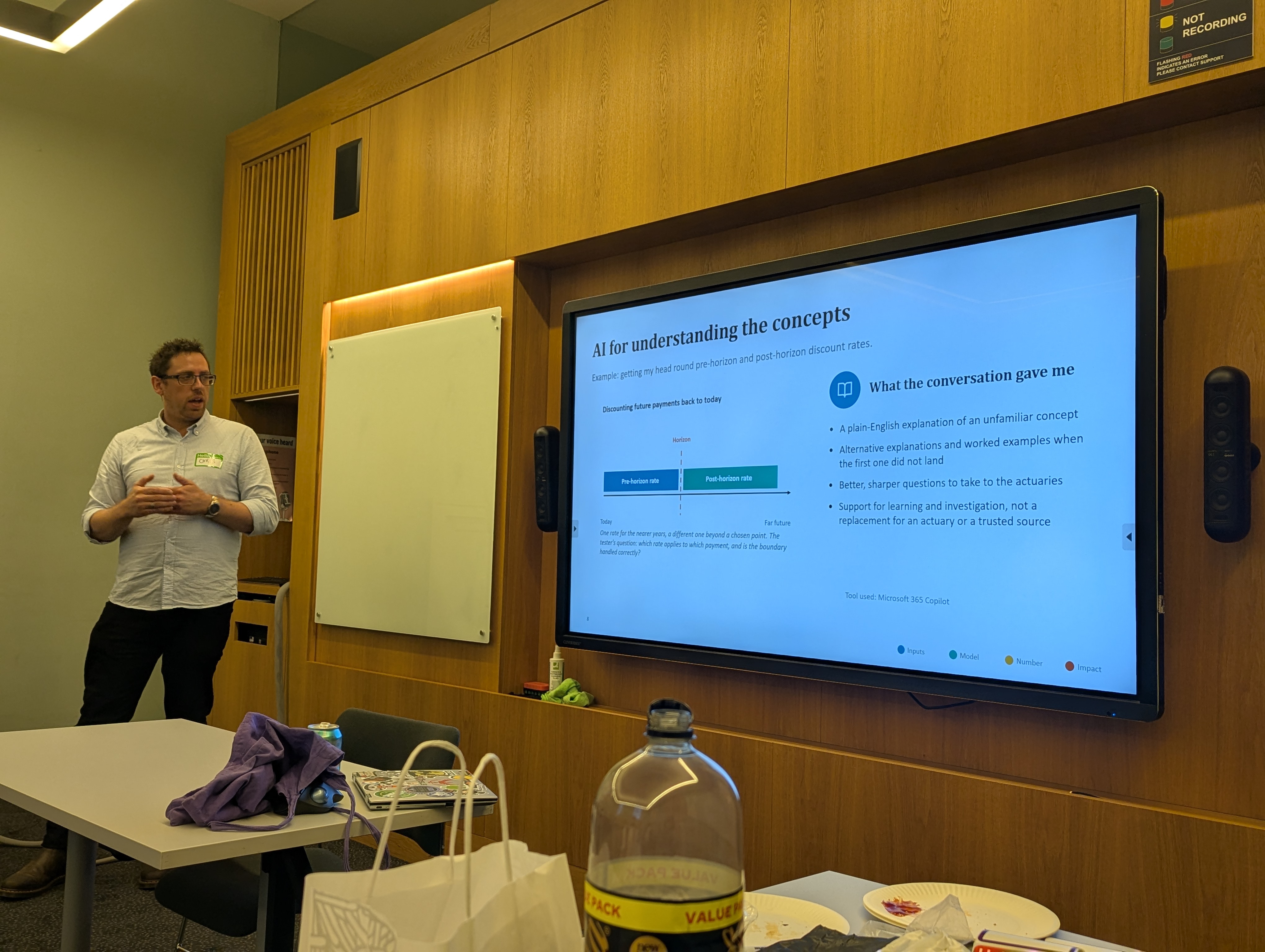 Image of a man giving a presentation  image