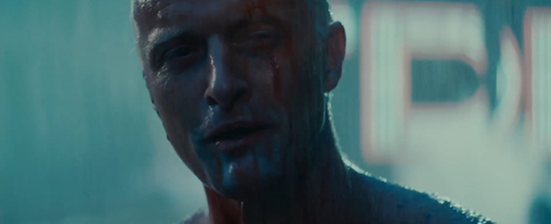 Image from bladerunner's famous scene.
White haired man with a bloodied face in the rain. Blue lighting to express n... image