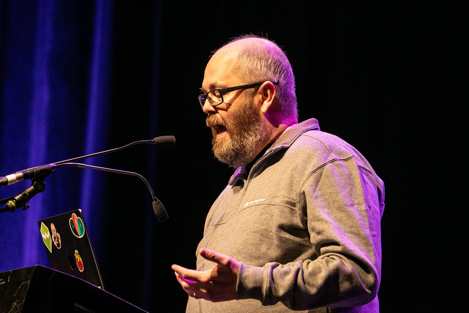 Paul doing a 99 second talk on stage.