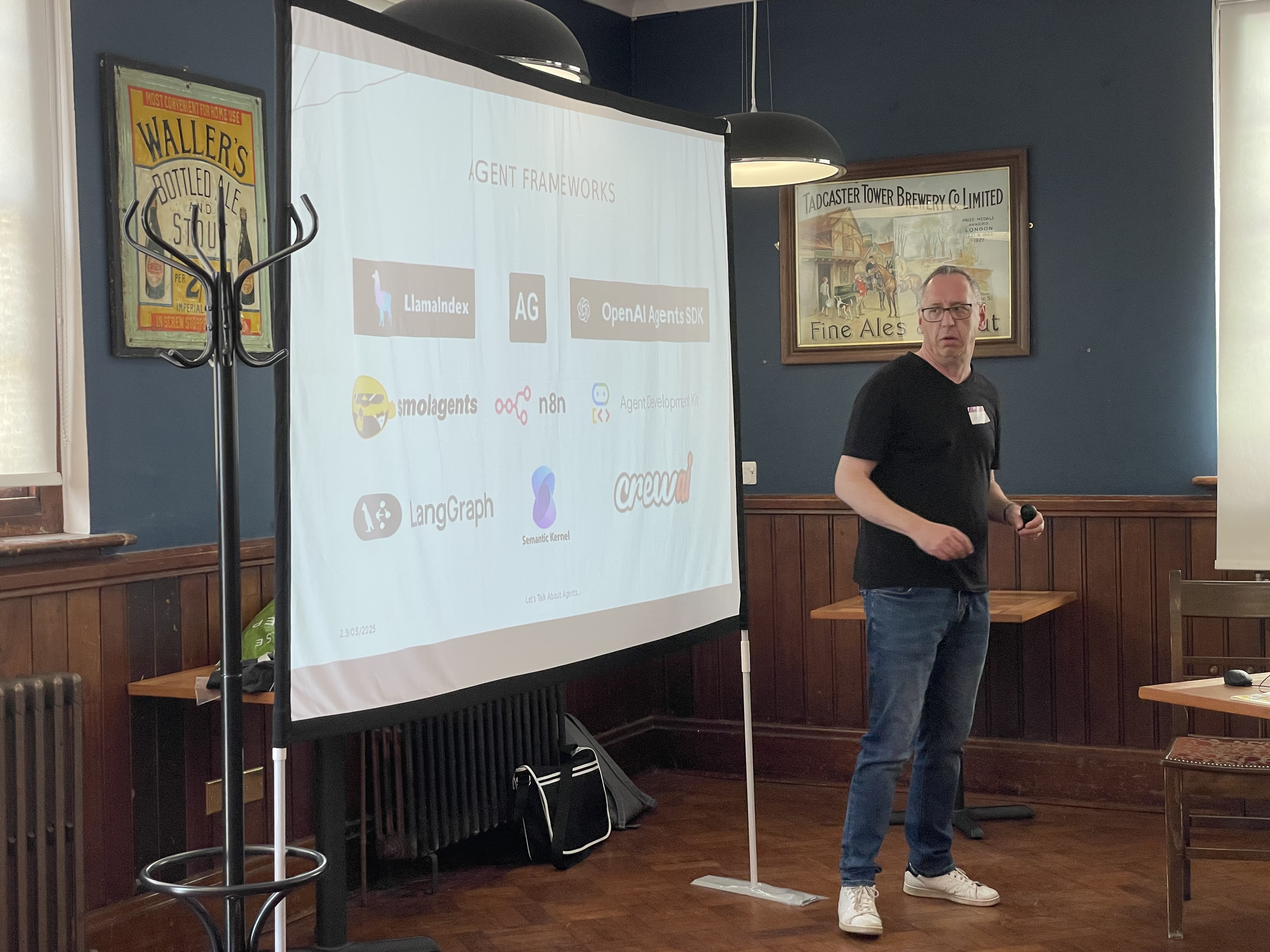 A photo with a list of Agent Frameworks and Andy on stage. The list of Agent Frameworks is already listed in the commentary.