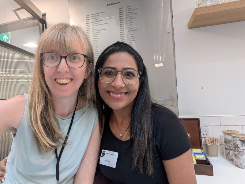 This is a photo of Melissa and Suman after a talk at SiGIST. image