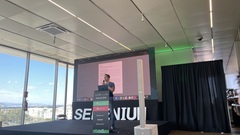 Daniel takes the stage for a lightning talk | SeleniumConf image