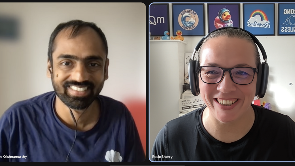 A screenshot of Anupam and Rosie Sherry smiling.