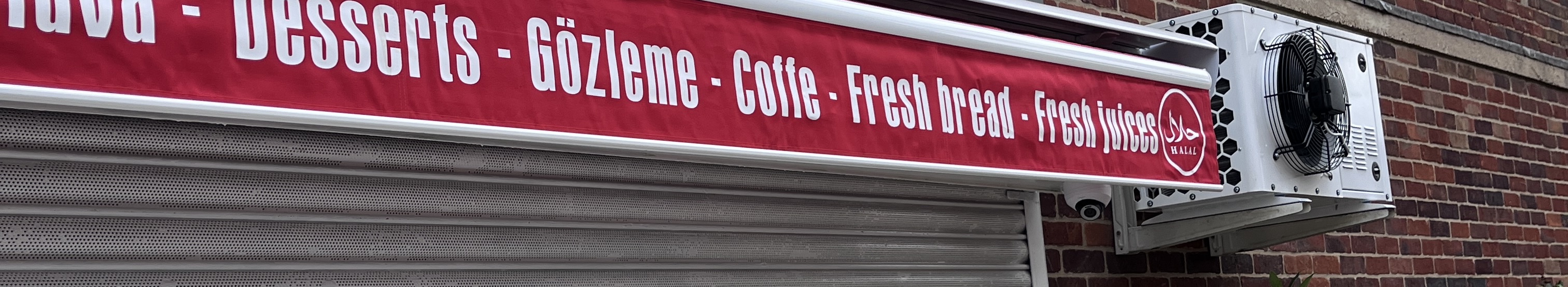 Signage reads Coffe rather than Coffee image