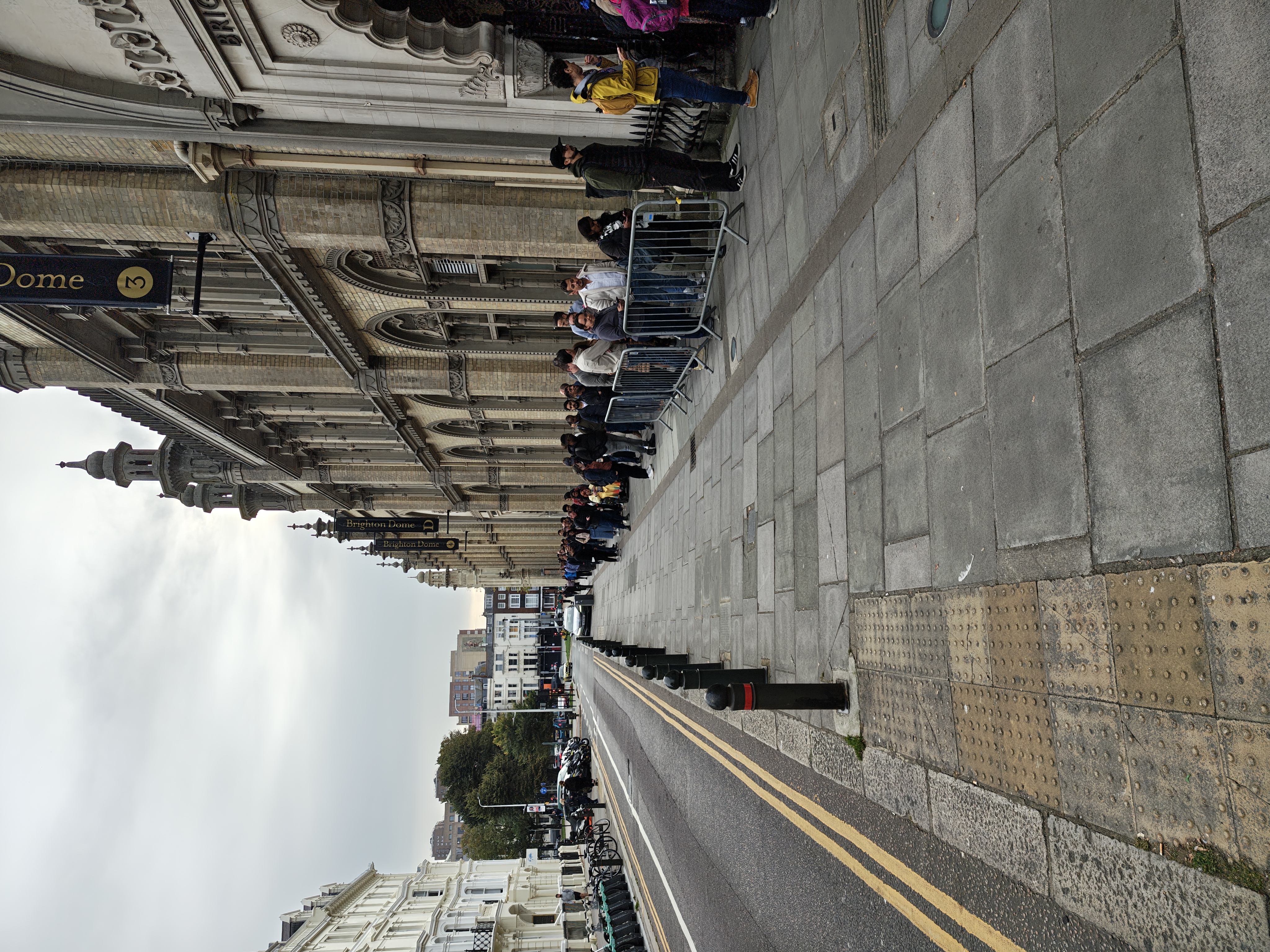 A very long queue of testers wait to enter Brighton Dome for TestBash 2025