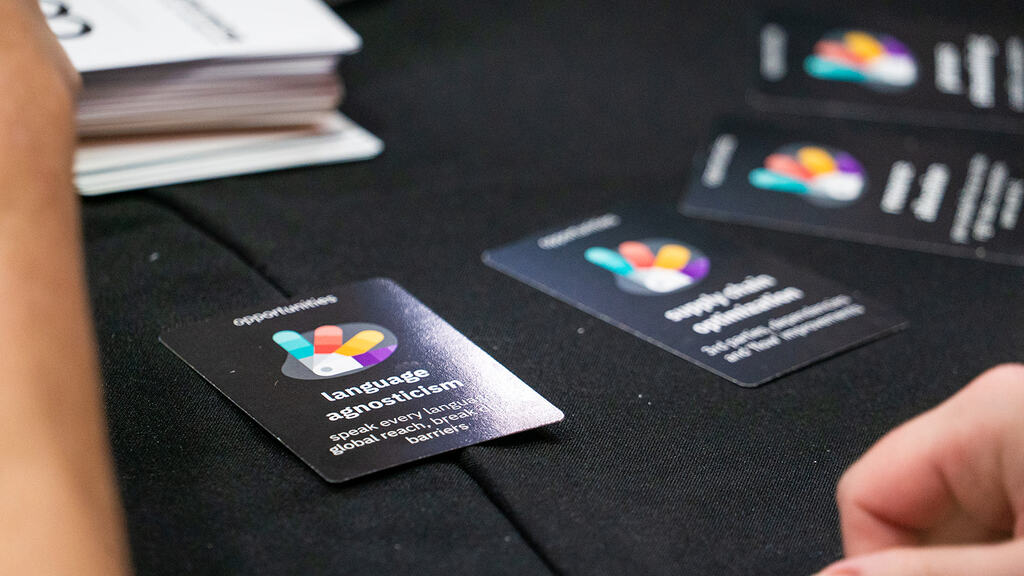 People gathered around a Riskstorming and AI session.