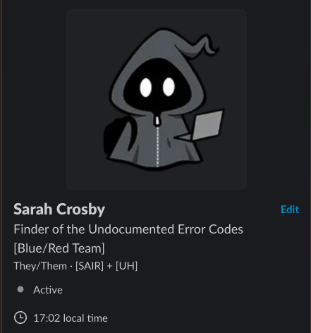 A Slack profile for Sarah Crosby featuring a dark-themed interface. The profile image shows a small hooded, ghost-like character with glowing white eyes, holding a piece of paper. The display name reads “Sarah Crosby” with the title “Finder of the Undocumented Error Codes.” Additional details include “[Blue/Red Team],” “They/Them · [SAIR] + [UH],” status marked as Active, and local time shown as 17:02.