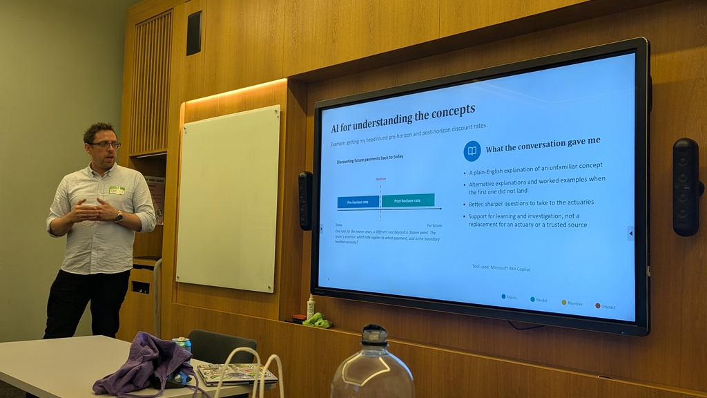 Image of a man giving a presentation  image