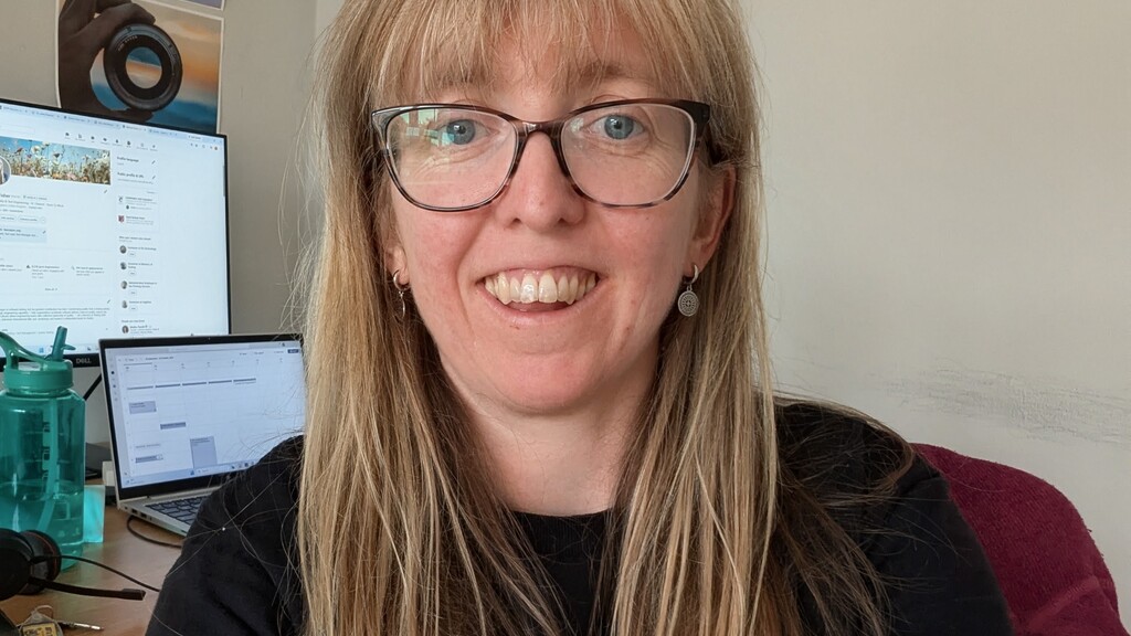 A photo of me, a white female with long light coloured hair wearing glasses. image