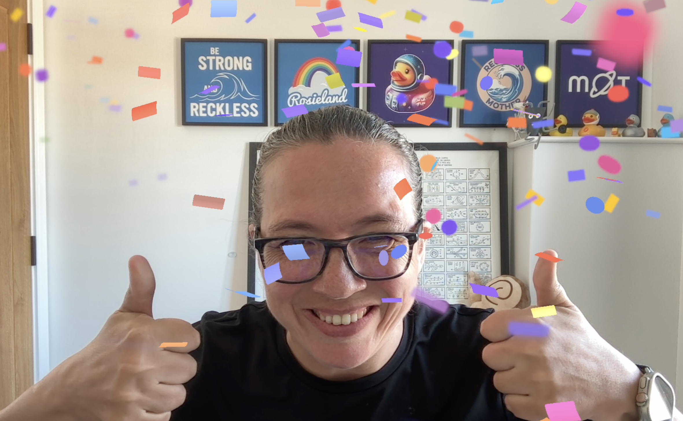 Double thumbs up with confetti Rosie image