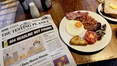 A table with Full English Breakfast and eleventh Issue of The Testing Planet. image