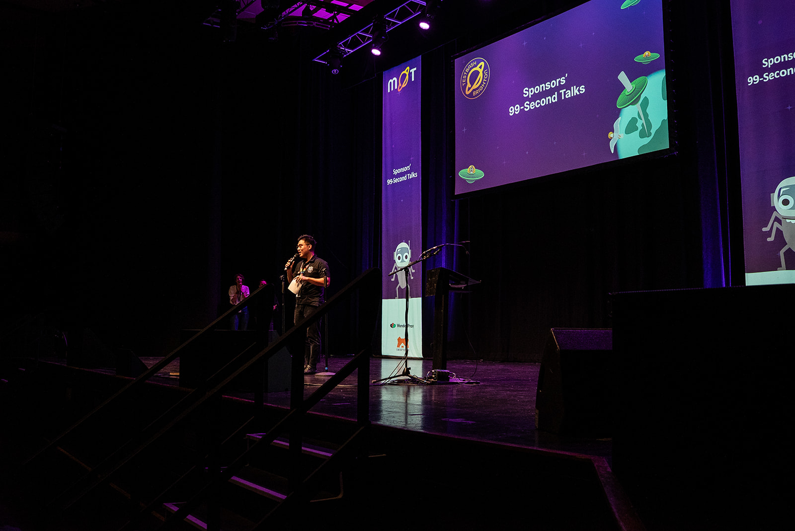 Vu Tran on the stage at MoTacon 25.