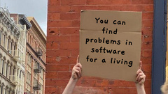 How would you explain what you do on a cardboard sign? image