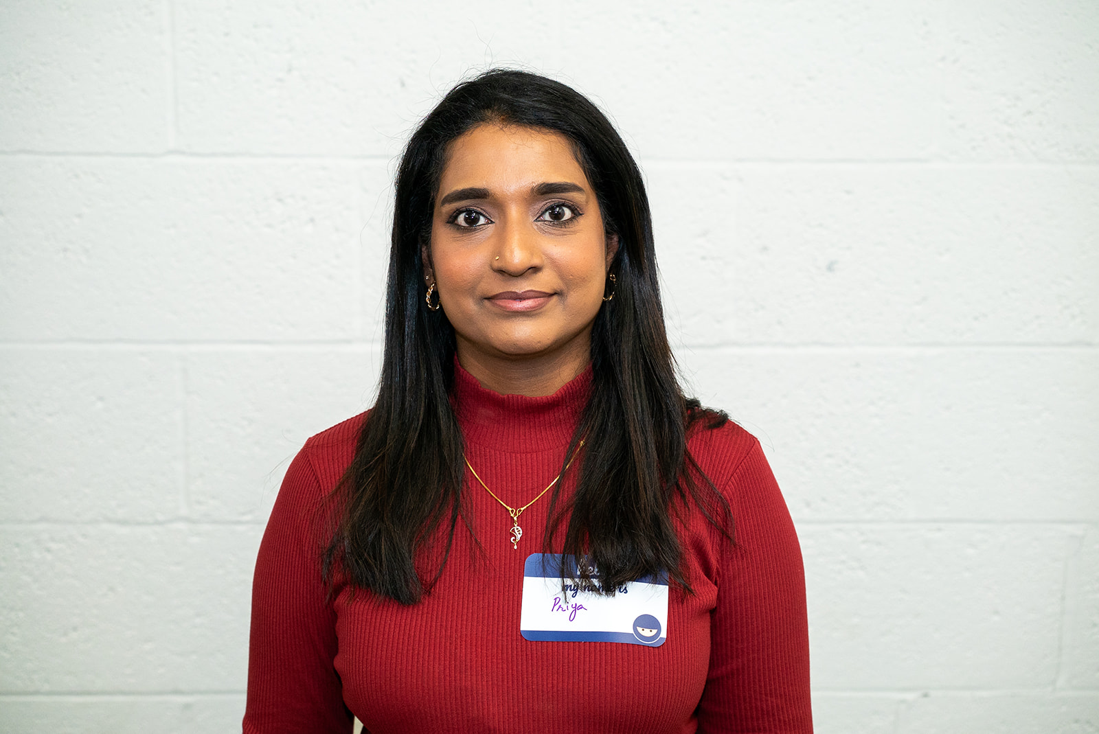 A portrait photo of Priyanka taken at MoT London