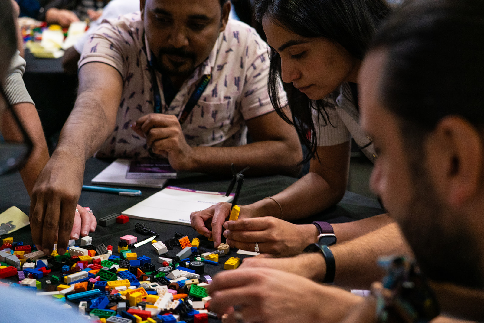 People collaborating and learning via Lego