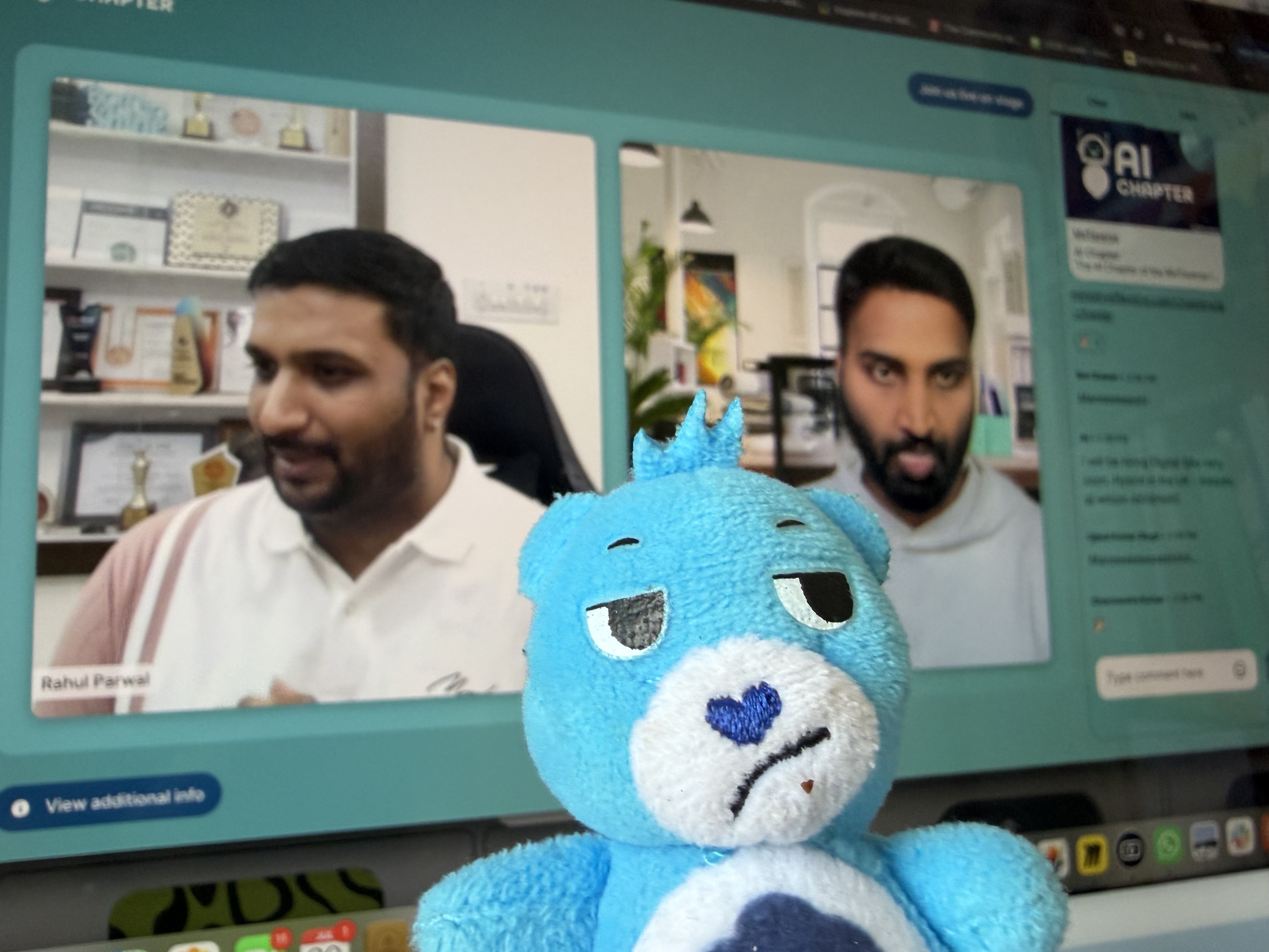Photo of Grumps at the AI Chapter with Rahul and Maneesh in the background. image