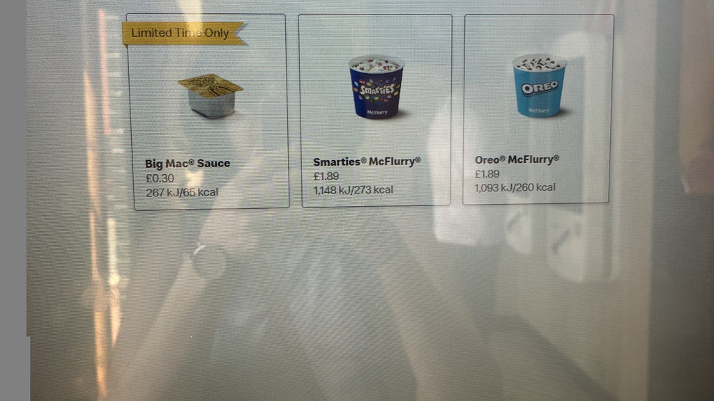 On a self checkout screen in McDonalds, the screen shows 'May we suggest' with 3 options:
Big Mac Sauce 
Smarties M... image