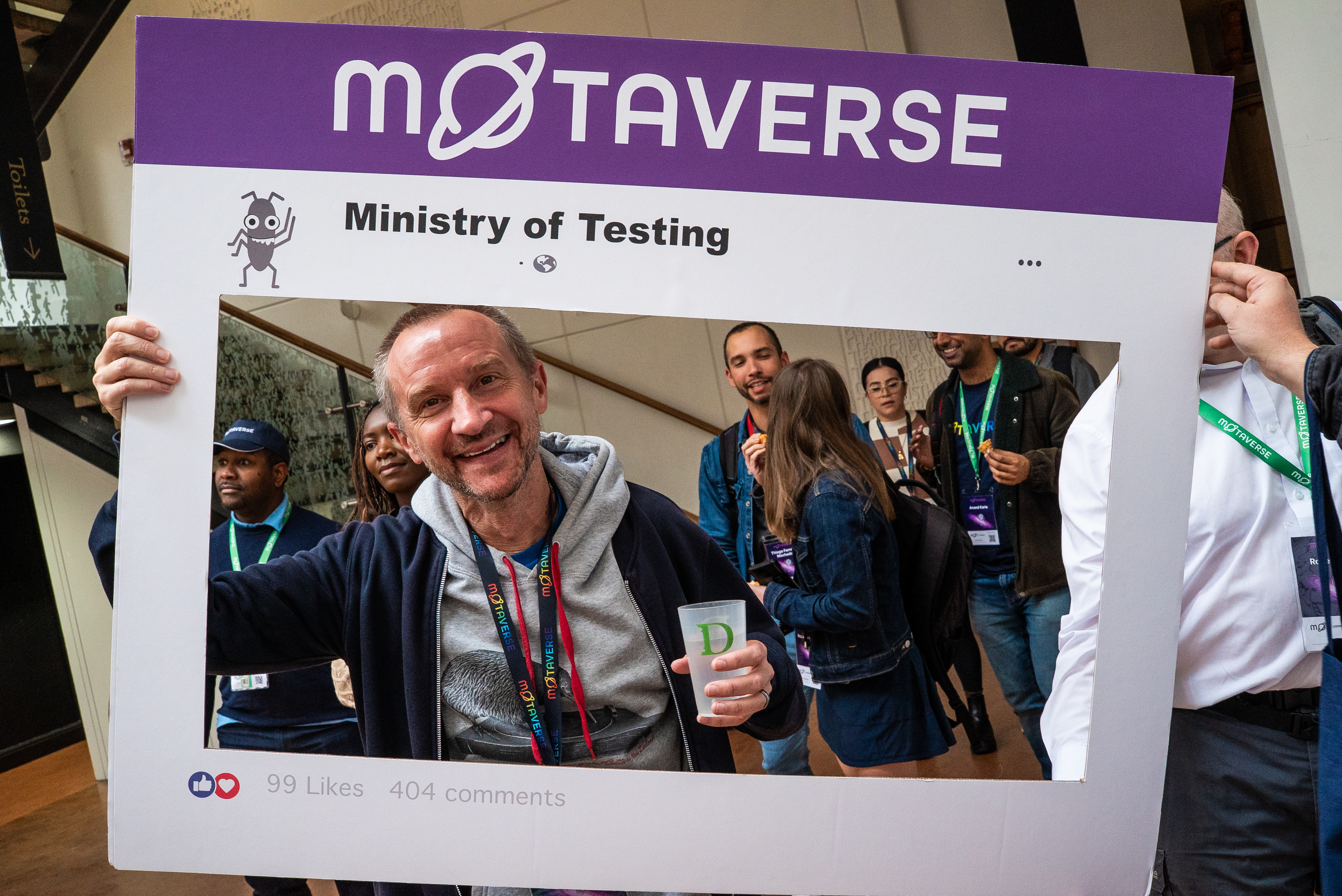 Simon Rigler holds up a MoTaverse photo frame image