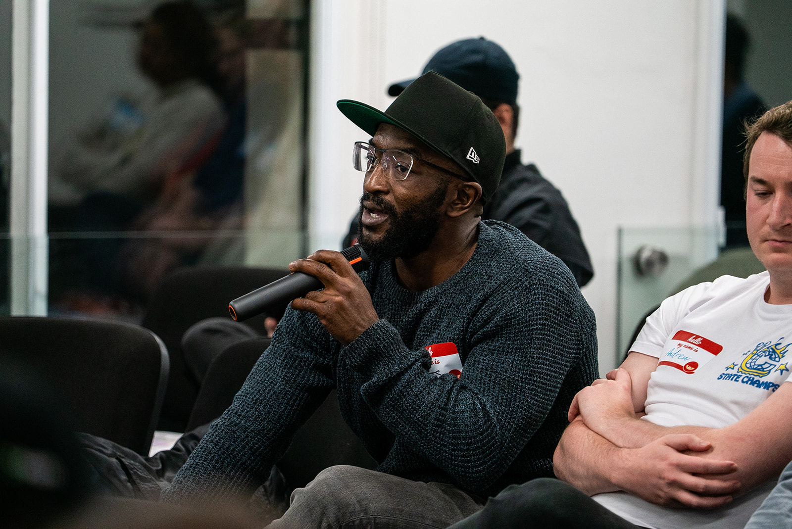 A member of the audience asking a question