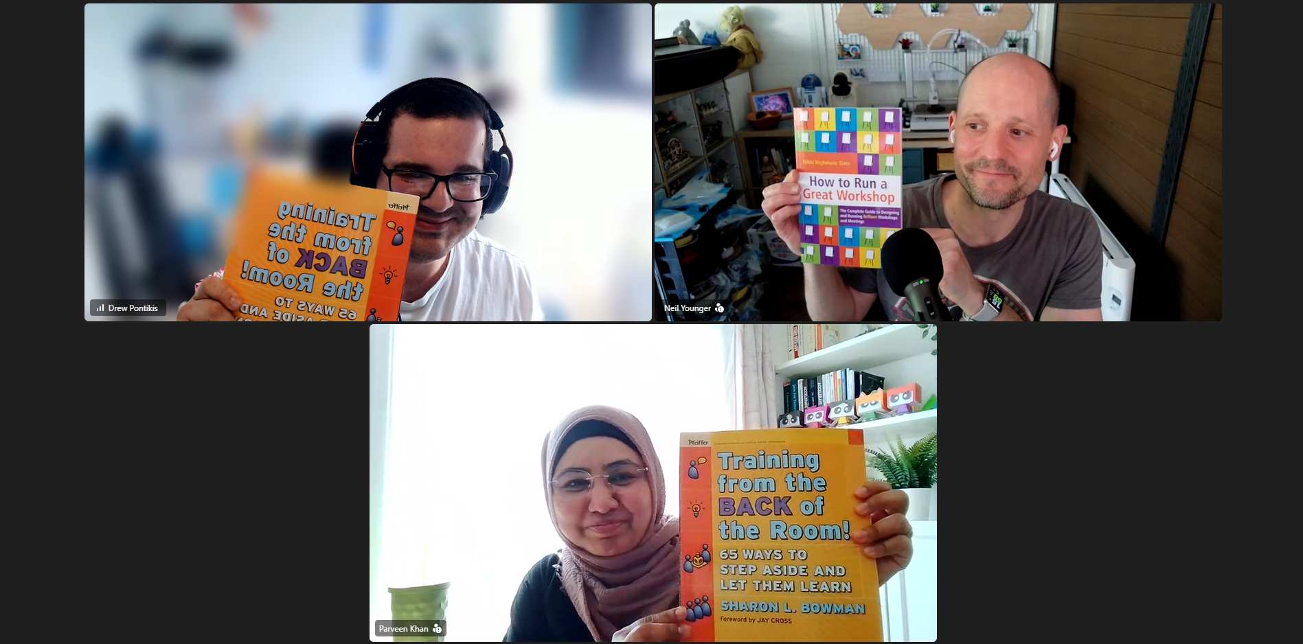Neil Younger, Drew Pontikis and Parveen Khan comparing books whilst designing their Motacon workshop image