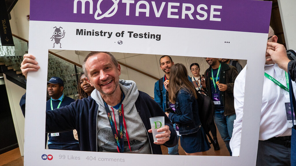 Simon Rigler holds up a MoTaverse photo frame image