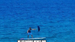 an image of a man in sea against a much larger ship in the backdrop image