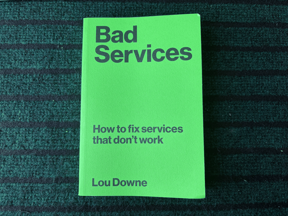 A rotating gif of photos of the book 'bad services'. They are visually pleasing. image