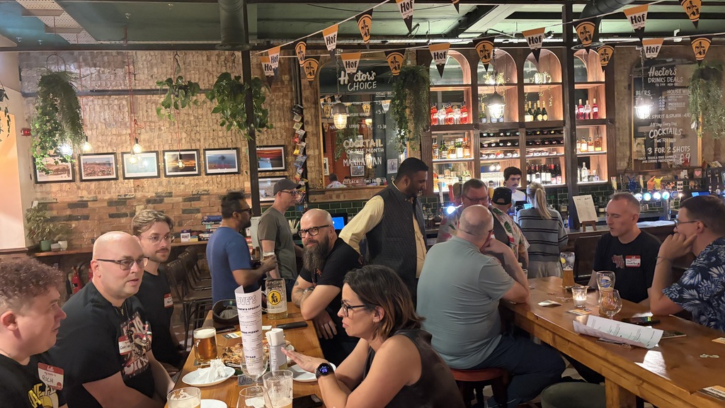 Good people in a pub, having conversations. image