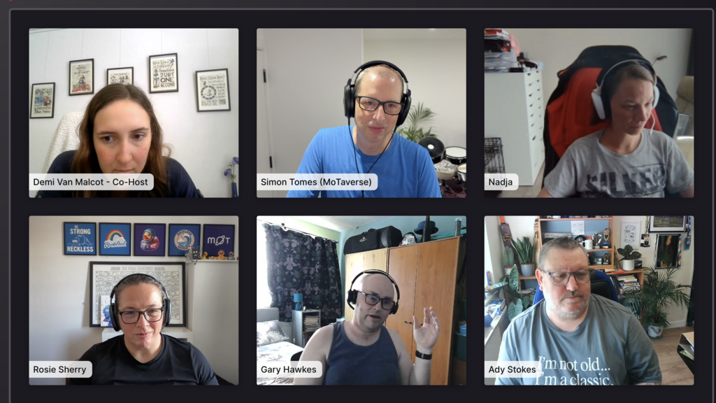 Screenshot of a 6-person live video conference grid on a dark interface. Top row, left to right: Demi Van Malcot - Co... image