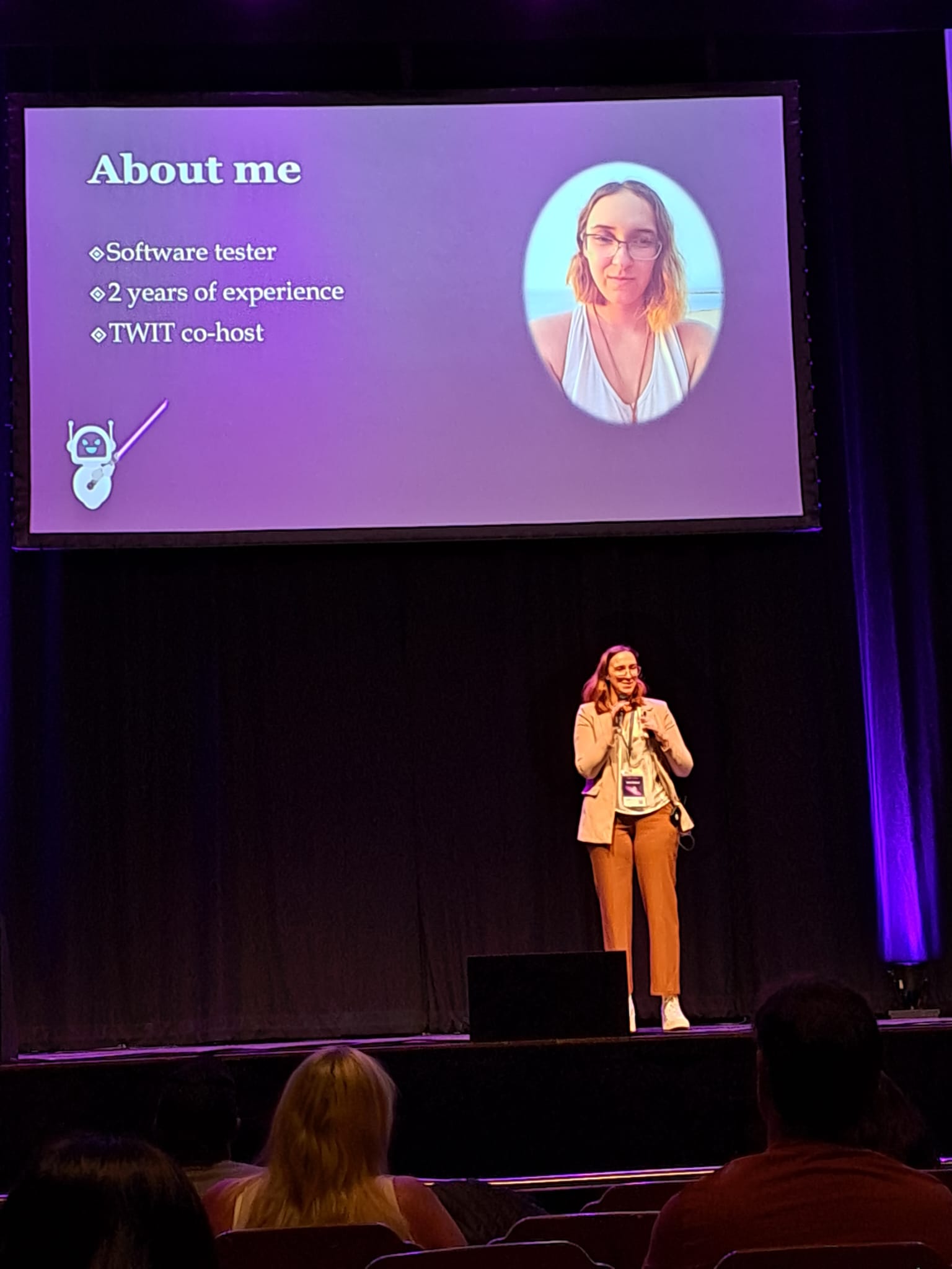 Demi giving a presentation on continuous quality