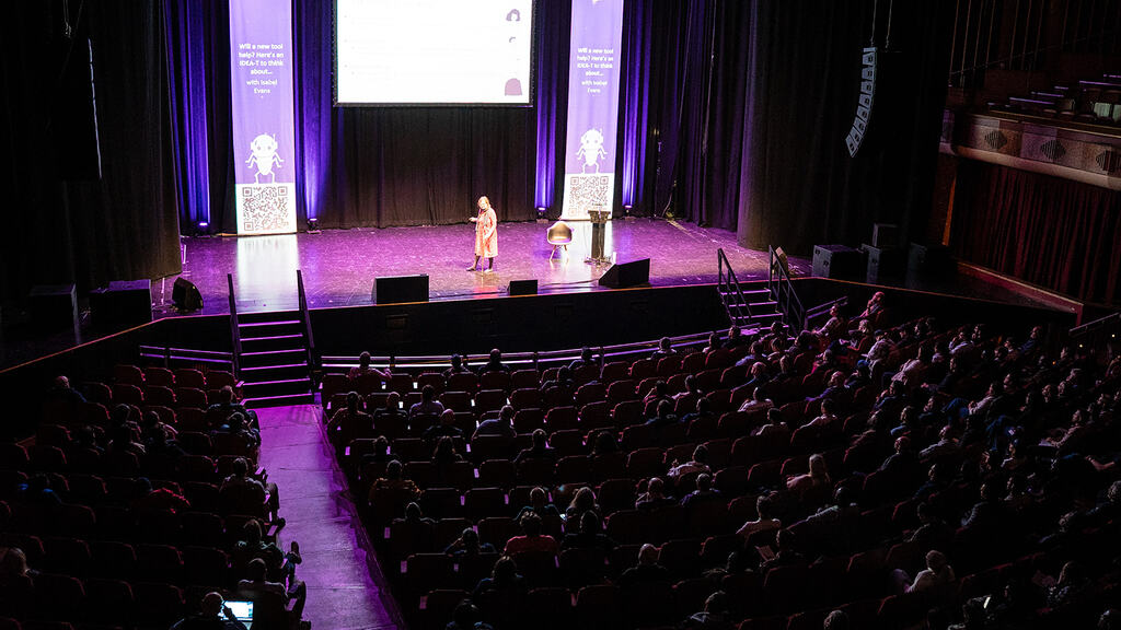 MoTaCon stage with Isabel Evans image